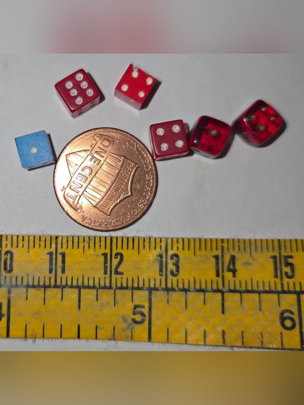 Vintage .5mm miniature dice including a Bakelite set